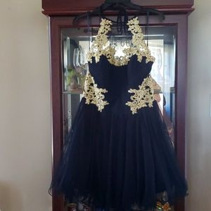 A Navy with Gold Appliques evening dress, size 13